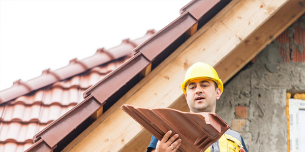 Installation de nouvelle toiture en tuiles